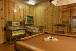 Game Room with Pool Table, Movie Projector, and Vintage Arcade Games